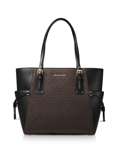 michael kors black patent leather signature tote|michael michael kors voyager east west signature tote.